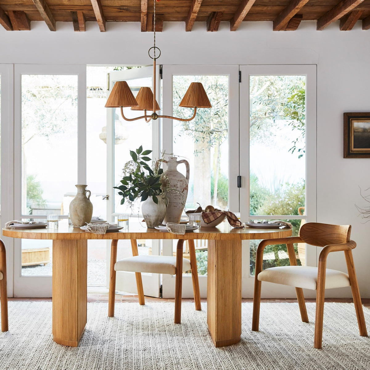 delphine chandelier over dining table
