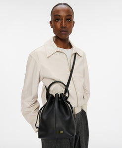 Model wears the Dea Bucket in Black