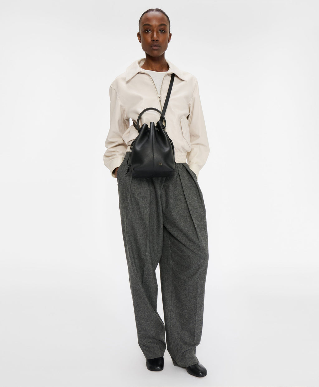 Model wears the Dea Bucket in Black