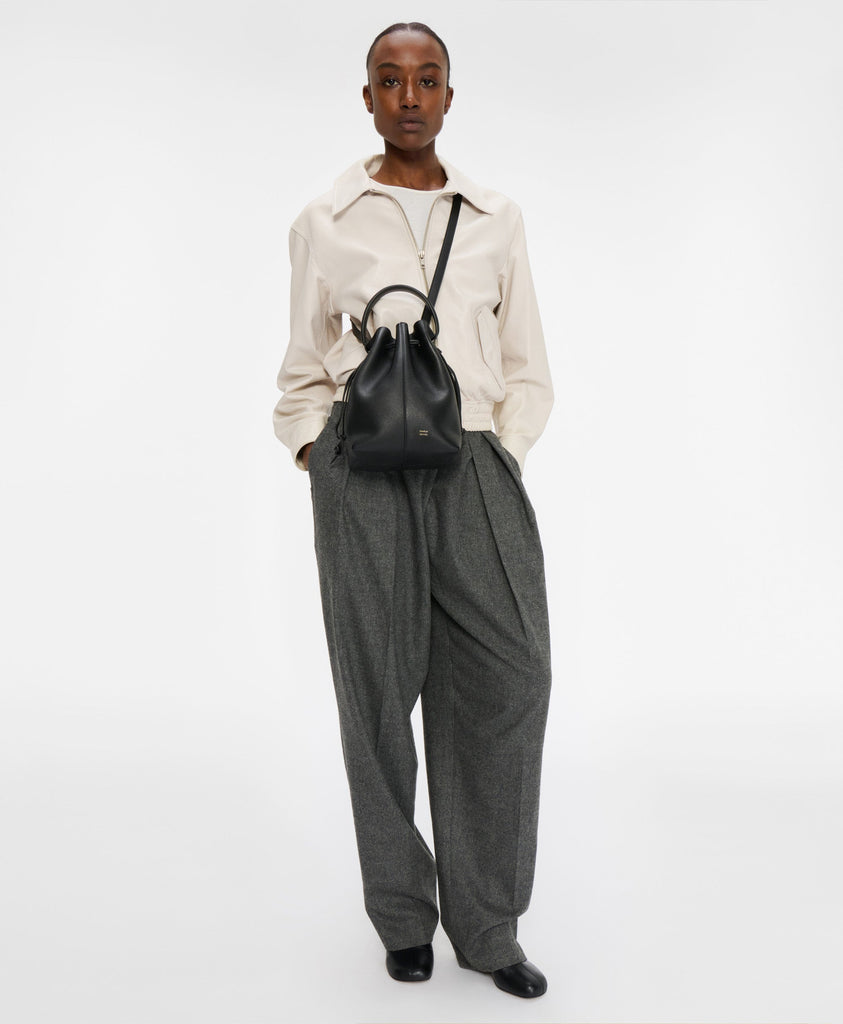 Model wears the Dea Bucket in Black