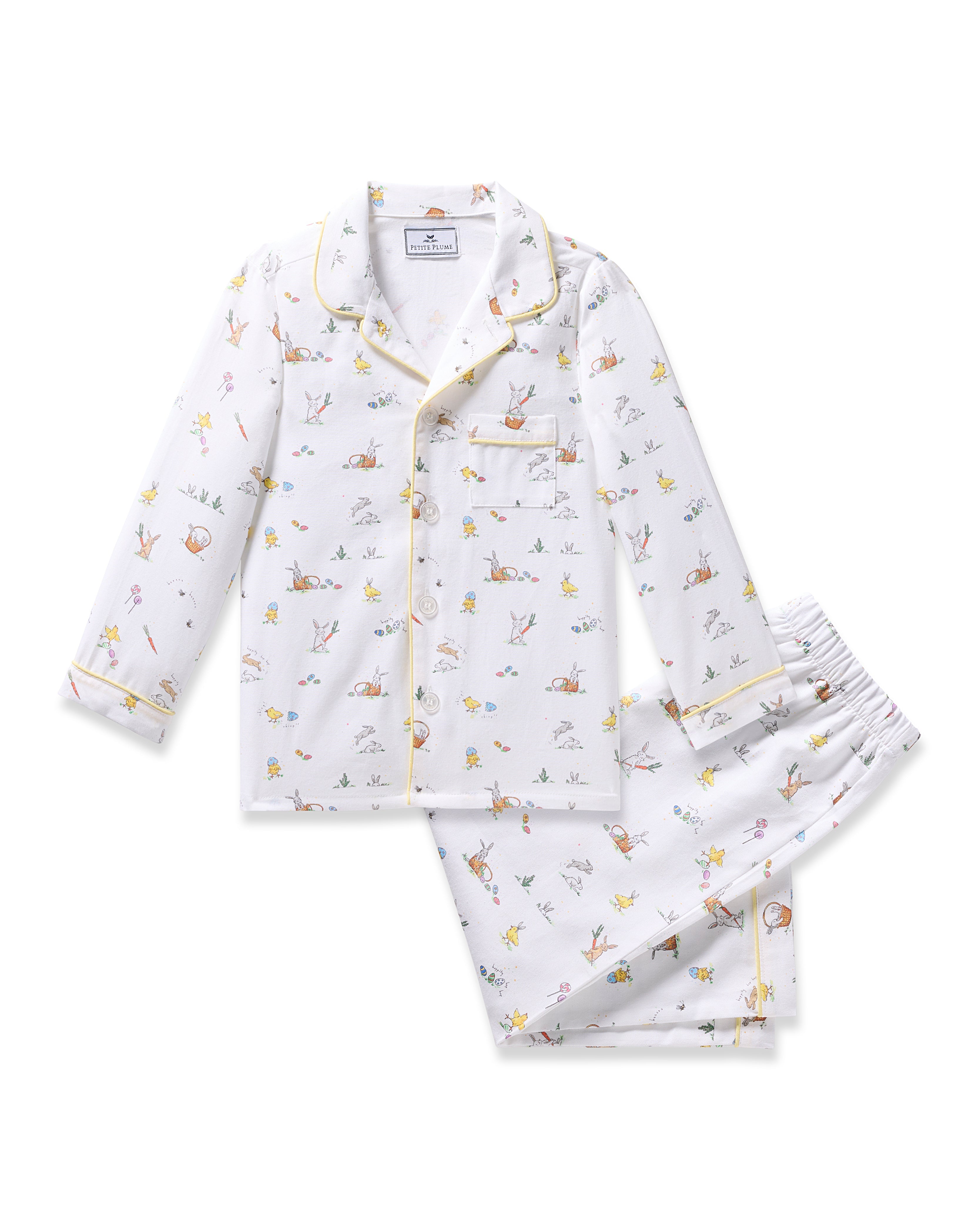 Check out the Kids Twill Pajama in Easter Frolic by Petite Plume. This classic set features colorful woodland prints of rabbits, foxes, and birds on a white background. Its flame-retardant with a long-sleeved button-up top, collar, and matching pants for safety and comfort.
.