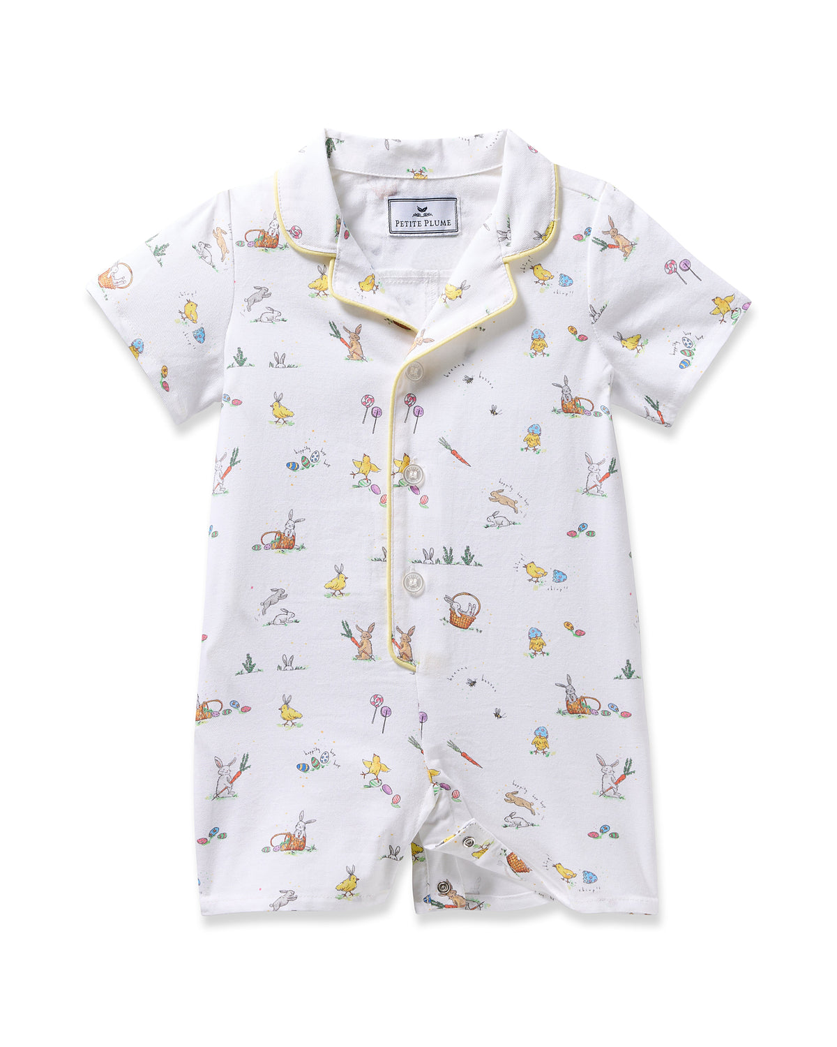 Front view of Baby’s Twill Romper in Easter Frolic showcasing an Easter print and yellow piping on white background