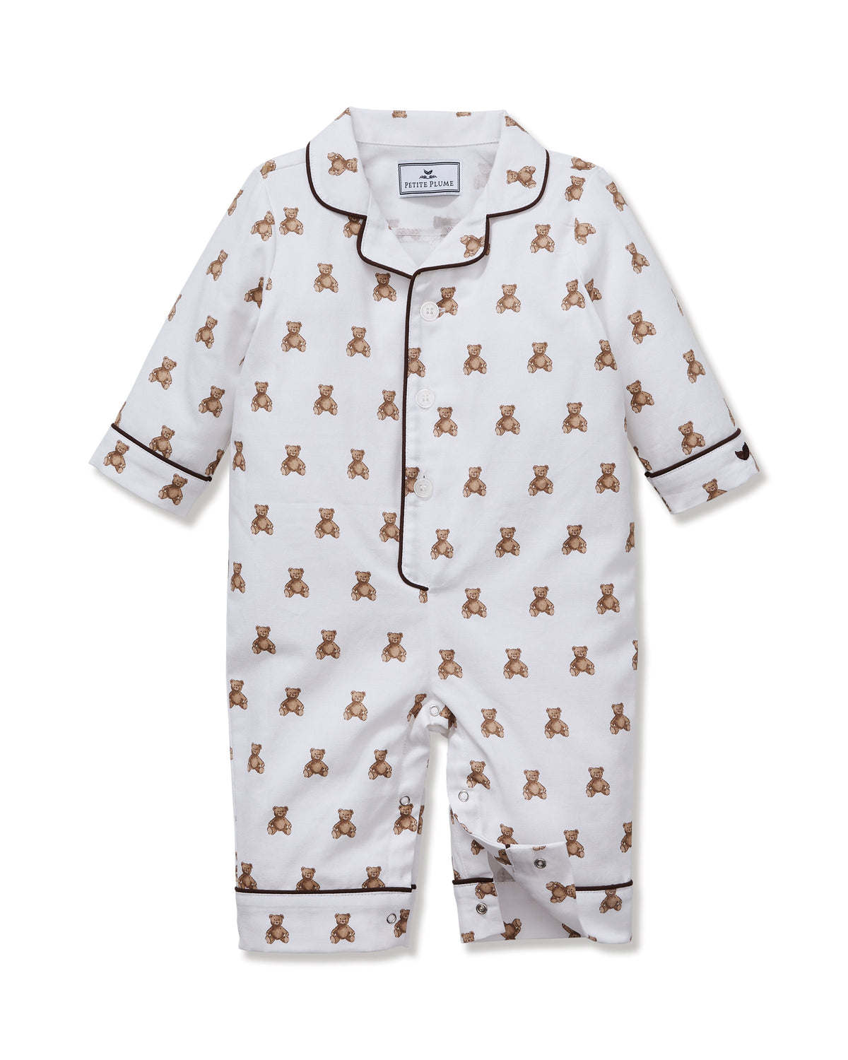 Front view of baby twill romper with brown teddy-print, brown piped trim, button front and snap leg openings on white background