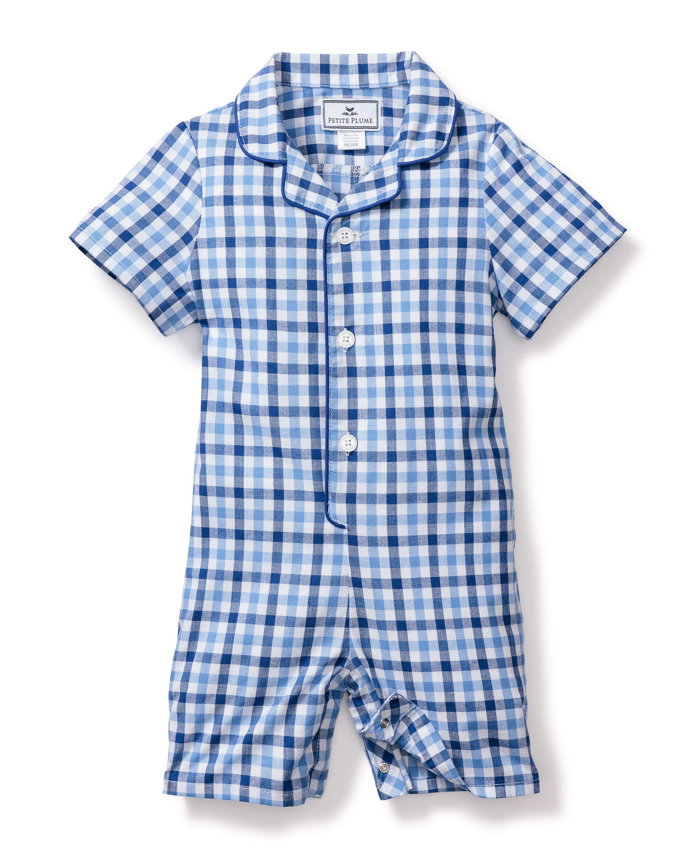 A short-sleeved, button-up romper designed for toddlers features a classic blue and white gingham print. Made from yarn-dyed cotton twill for durability, it has a collar and is labeled Petite Plume. The product is officially named Babys Twill Summer Romper in Royal Blue Gingham.