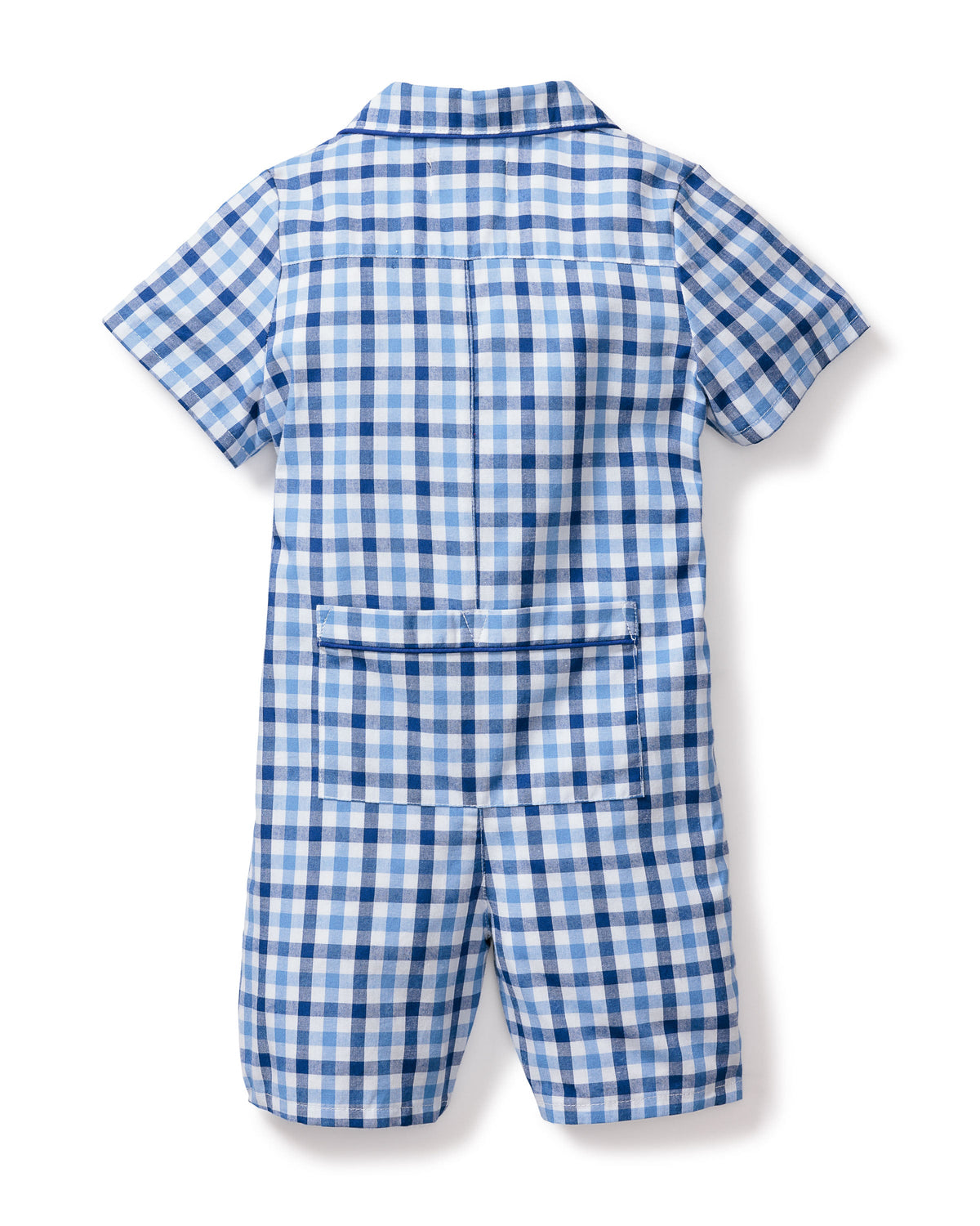 The Petite Plume Babys Twill Summer Romper in Royal Blue Gingham features short sleeves, a collar, a chest pocket, and a large rectangular back pocket. Made from yarn-dyed cotton, this romper offers a classic casual design ideal for play or lounging.