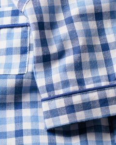 Close-up of Petite Plumes Kids Twill Pajama Short Set in Royal Blue Gingham, showcasing luxurious sleepwear with visible stitching and a rectangular pocket in a classic checkered pattern of small squares.