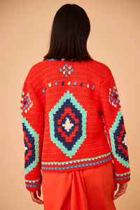 The best-selling Callen cardigan is a hand crocheted knit with long sleeves and an open front.
