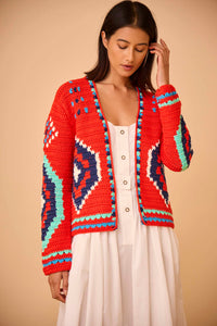 The best-selling Callen cardigan is a hand crocheted knit with long sleeves and an open front.
