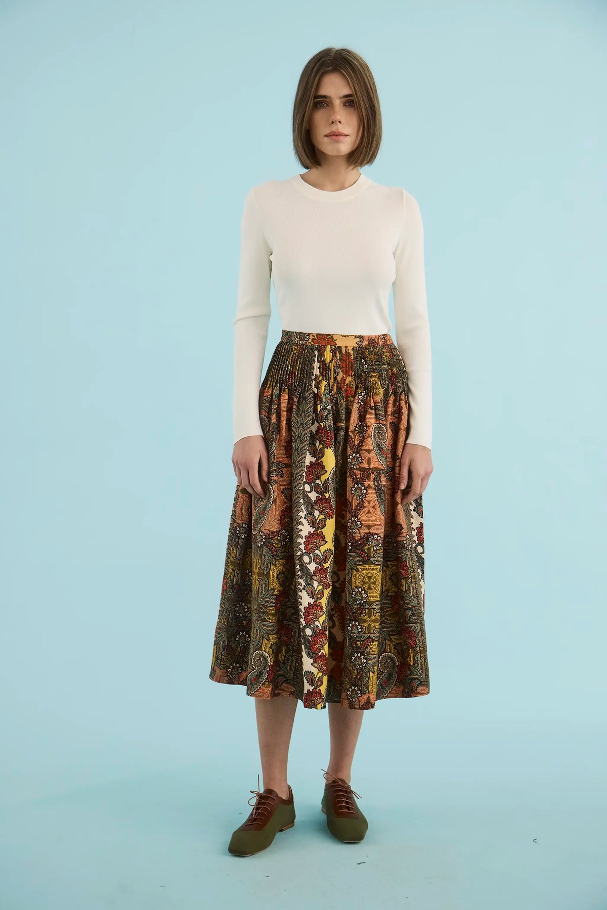 Callie Sweater in cream paired with Fallon Skirt in Highland Tapestry. 