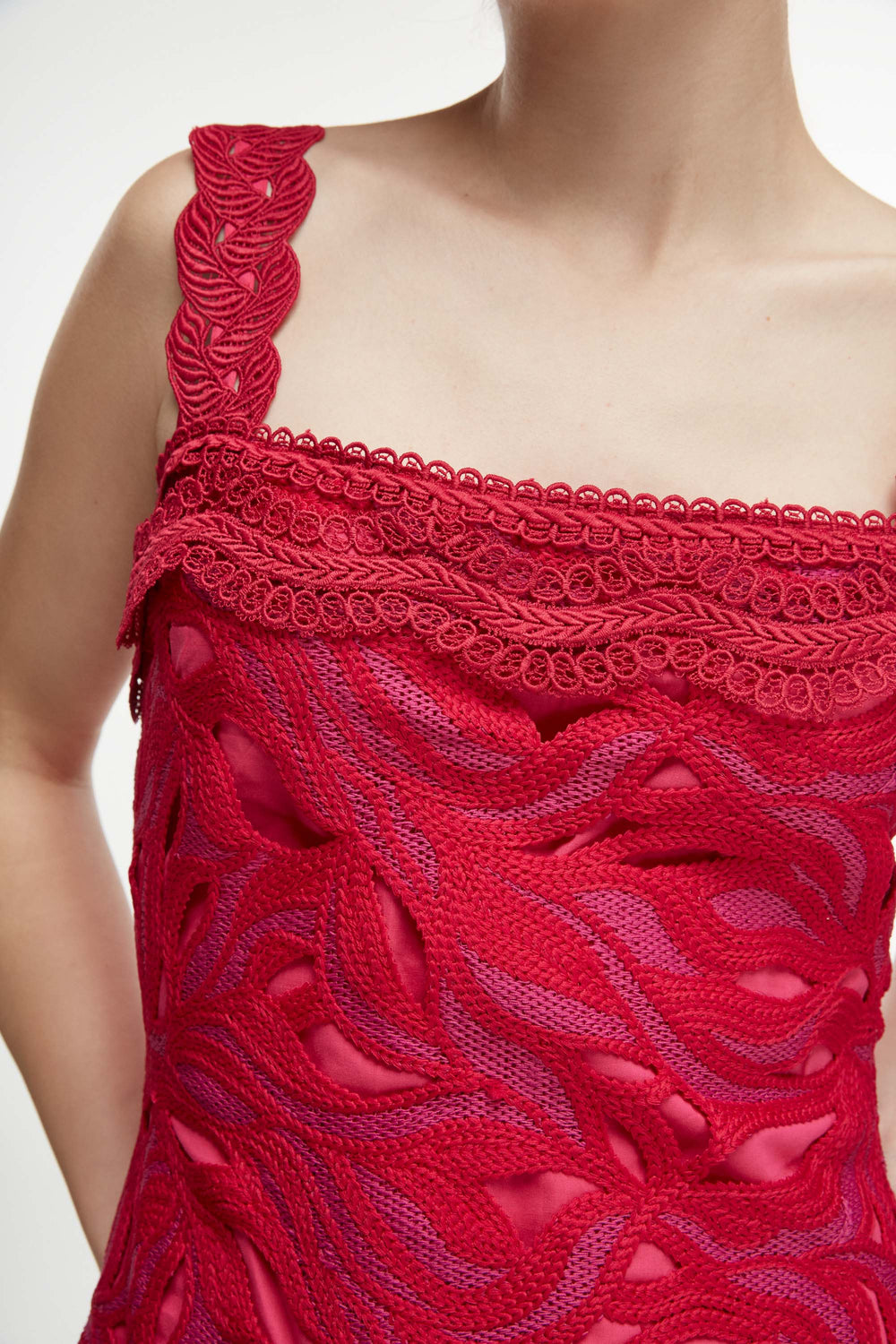Close-up front of Crepusculo Midi Dress in burgundy showing embroidered lace overlay, scalloped strap, and straight neckline