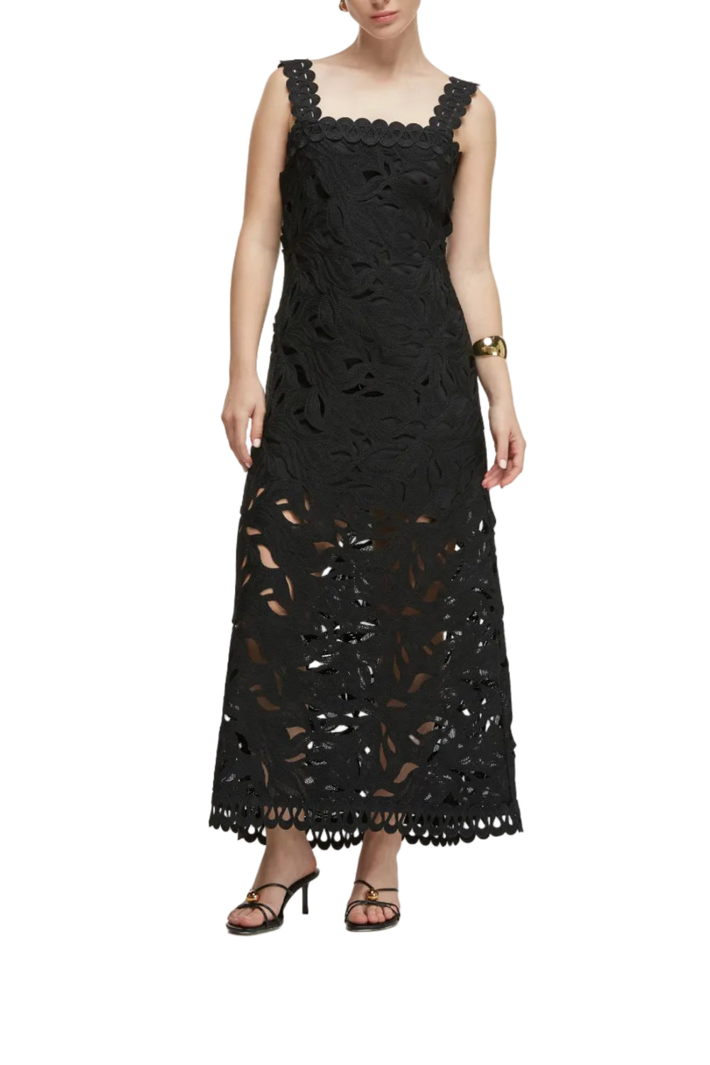Front view of Crepúsculo Midi Dress in black showcasing floral lace cutouts, straight neckline and scalloped wide straps on white background