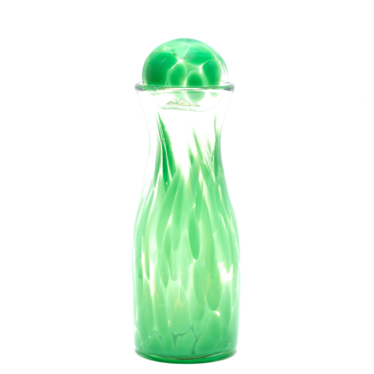 Front view of cactus green spotted glass carafe showcasing matching round topper on white background