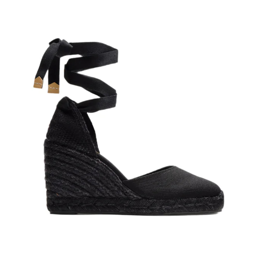 Side view of Carina 8 espadrille in black cotton showcasing dyed jute wedge and wraparound ankle ties on white background