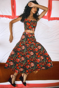 The Remy Skirt is a festive midi designed featuring a banded waist and a gathered full skirt.