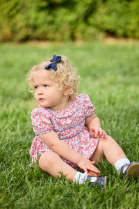 Little English traditional children's clothing.  Soft blue and raspberry red Lennox Floral short sleeve bubble for baby girls with ruffle collar and blue piping detail at sleeves and chest
