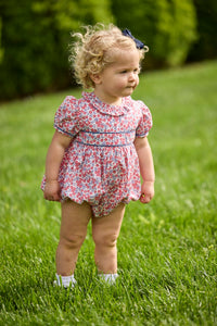 Little English traditional children's clothing.  Soft blue and raspberry red Lennox Floral short sleeve bubble for baby girls with ruffle collar and blue piping detail at sleeves and chest