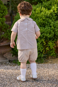 Little English traditional children's clothing.  Short sleeve pleated peter pan shirt in khaki gingham paired with khaki stone corduroy banded shorts.  Fall set for toddler boys.
