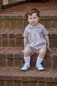 Little English traditional children's clothing.  Short sleeve pleated peter pan shirt in khaki gingham paired with khaki stone corduroy banded shorts.  Fall set for toddler boys.