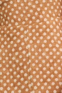 Close up of The Casey Dress in Coconut Sand Dot.