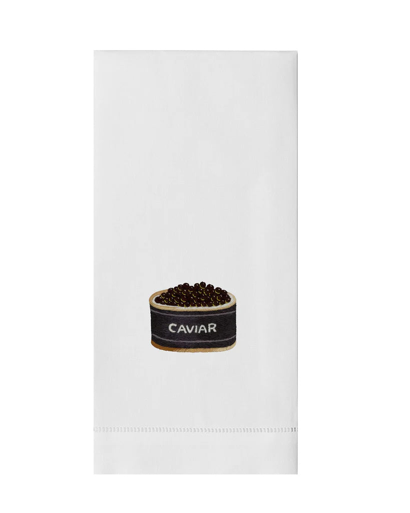 Front view of Caviar hand towel showcasing hand-embroidered caviar tin motif on white cotton with hemstitch detail