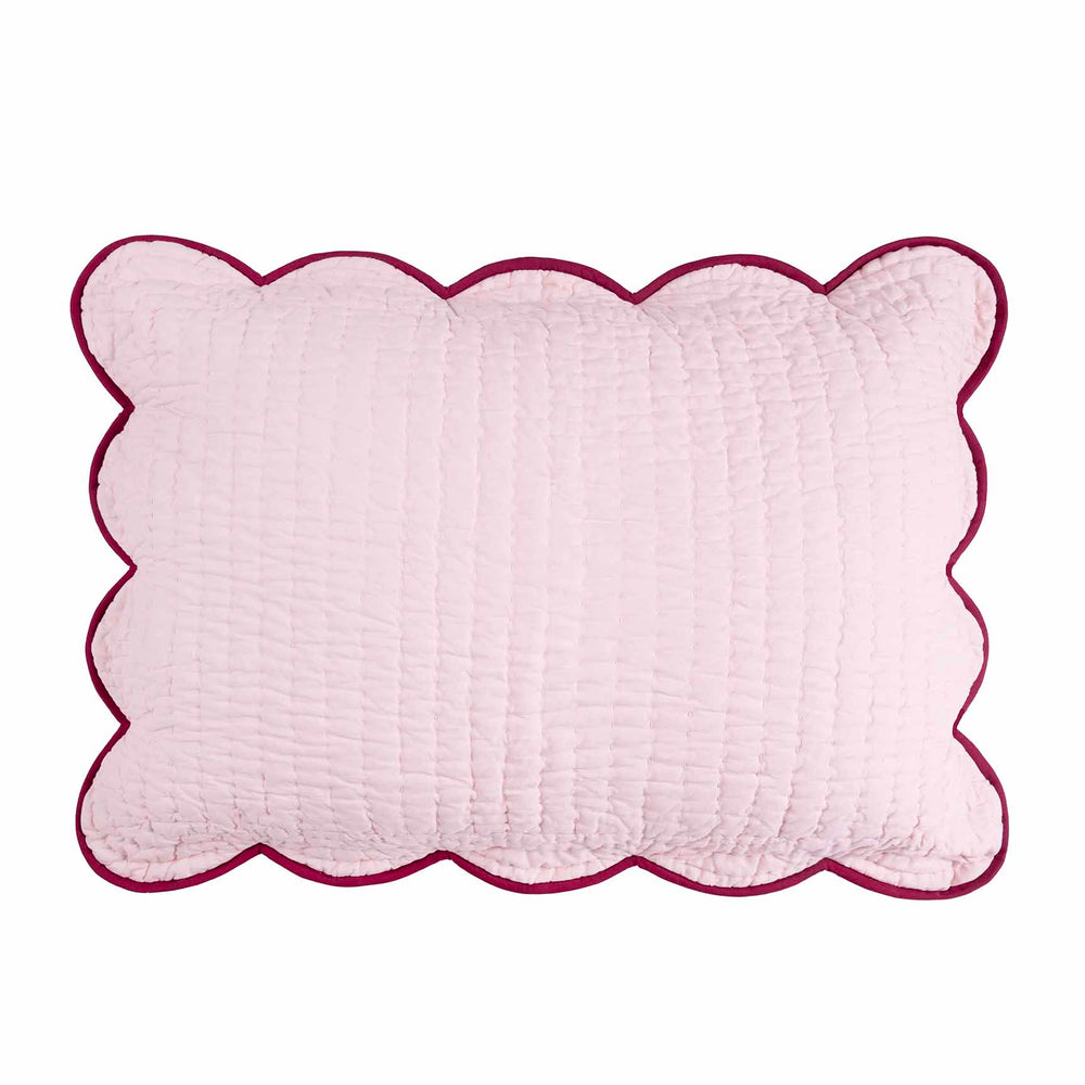 Front view of Chairish sham pillow showing scalloped edge and hand-stitched quilting in light pink with berry trim
