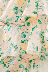 Close up of the Chelsea Dress, multi-tiered silk linen dress, in our Garden Rose Peony print.