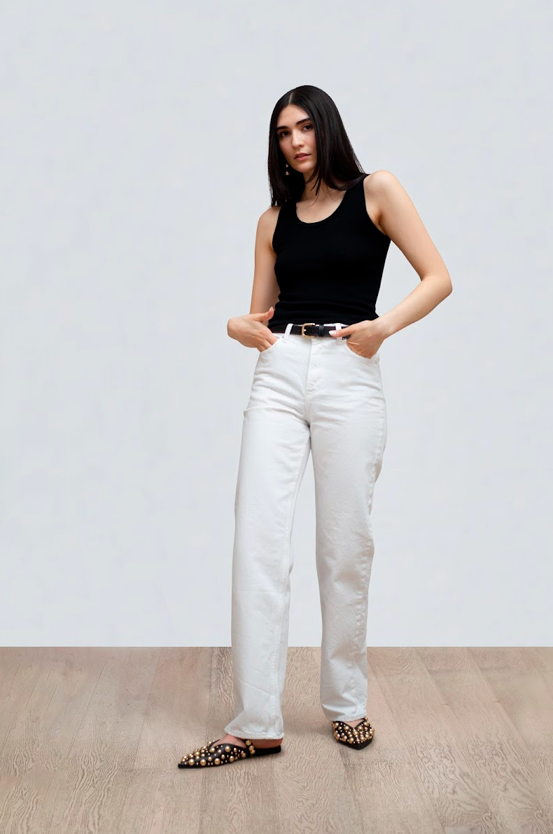 Front view of Chelsea Tank Black showcasing its sleeveless design and fitted silhouette on a model against a light studio background