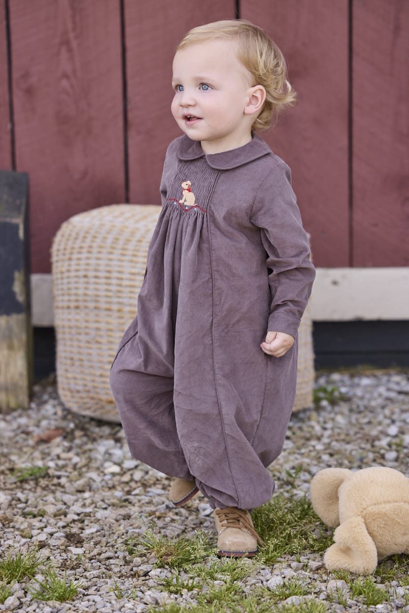 Little English traditional children's clothing.  Chocolate brown corduroy romper for baby boys with peter pan collar and lab smocking at the chest