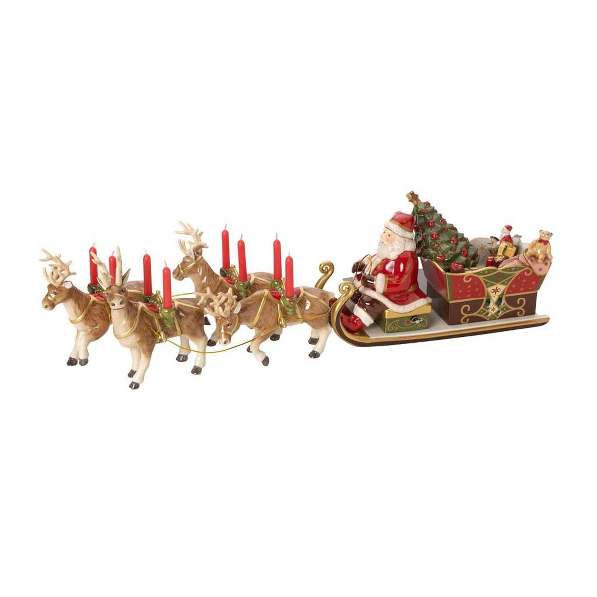 Side view of Villeroy and Boch hand-painted porcelain Santa sleigh with four reindeer and red candles on white background