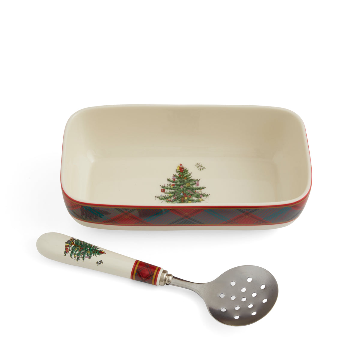 Top view of rectangular server with Christmas tree motif and tartan edge, with matching slotted spoon on white background