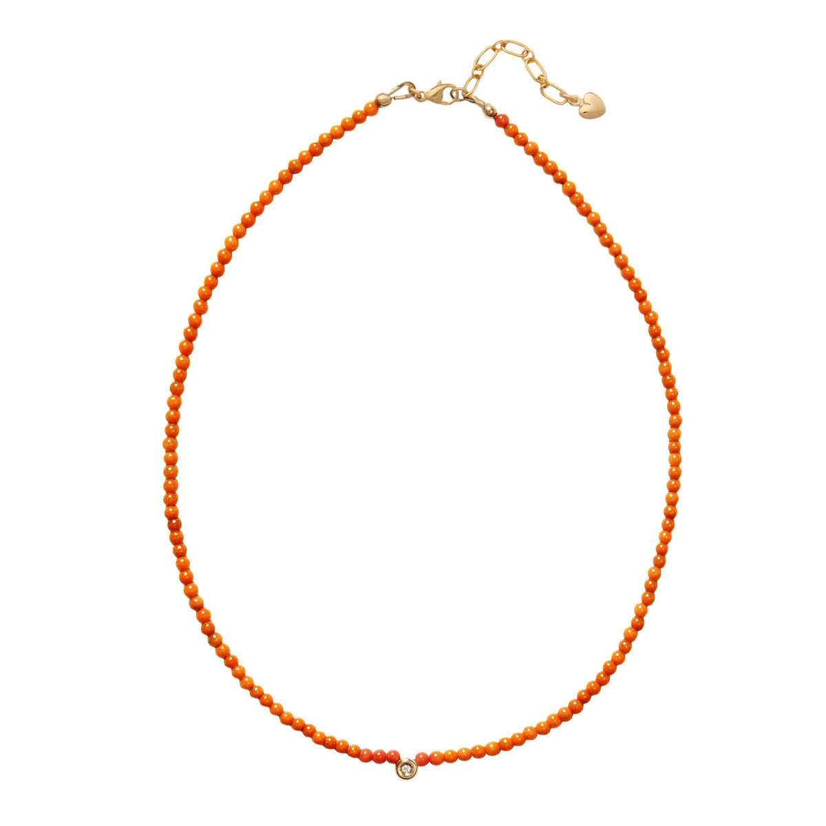 Front view of Claire Necklace showcasing dolomite coral beads and white topaz in a 24K antique gold-plated bezel on a white background