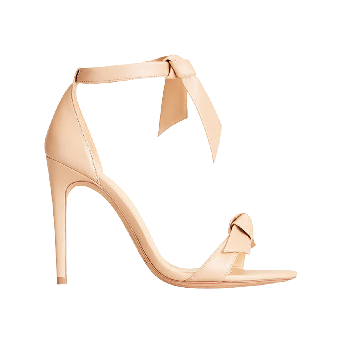 Side view of Clarita 100 beige leather sandal showcasing its slim stiletto heel and ankle ties on a white background