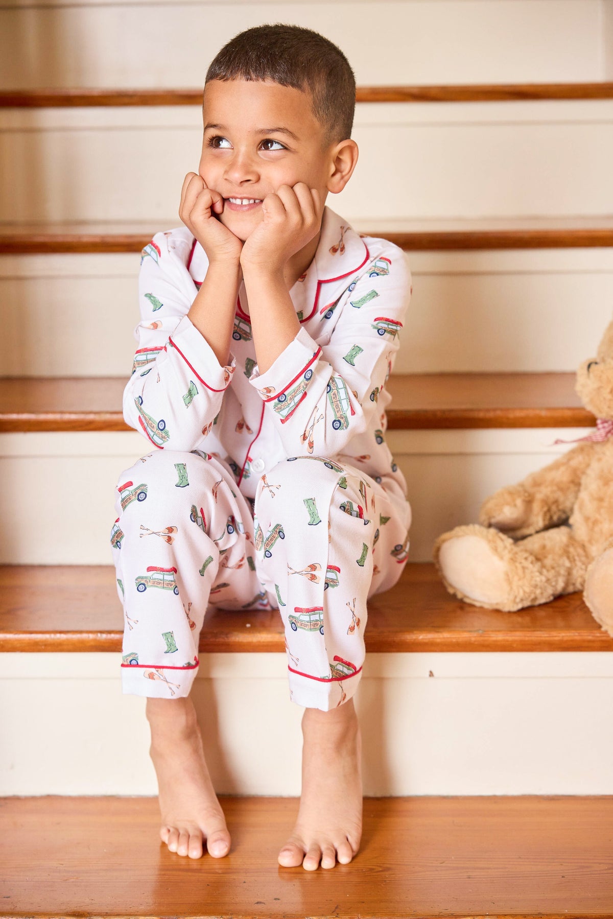 little english classic children's clothes,  boys wagoneer pajama set with a cream background and red piping 