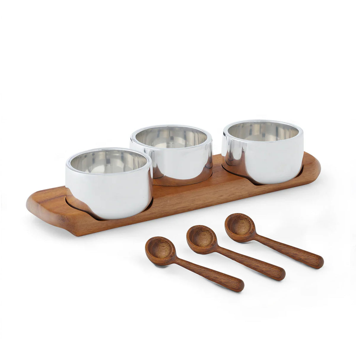 Front view of Classic Triple Condiment set with three polished alloy bowls in an acacia wood cradle and three wood serving spoons on white background