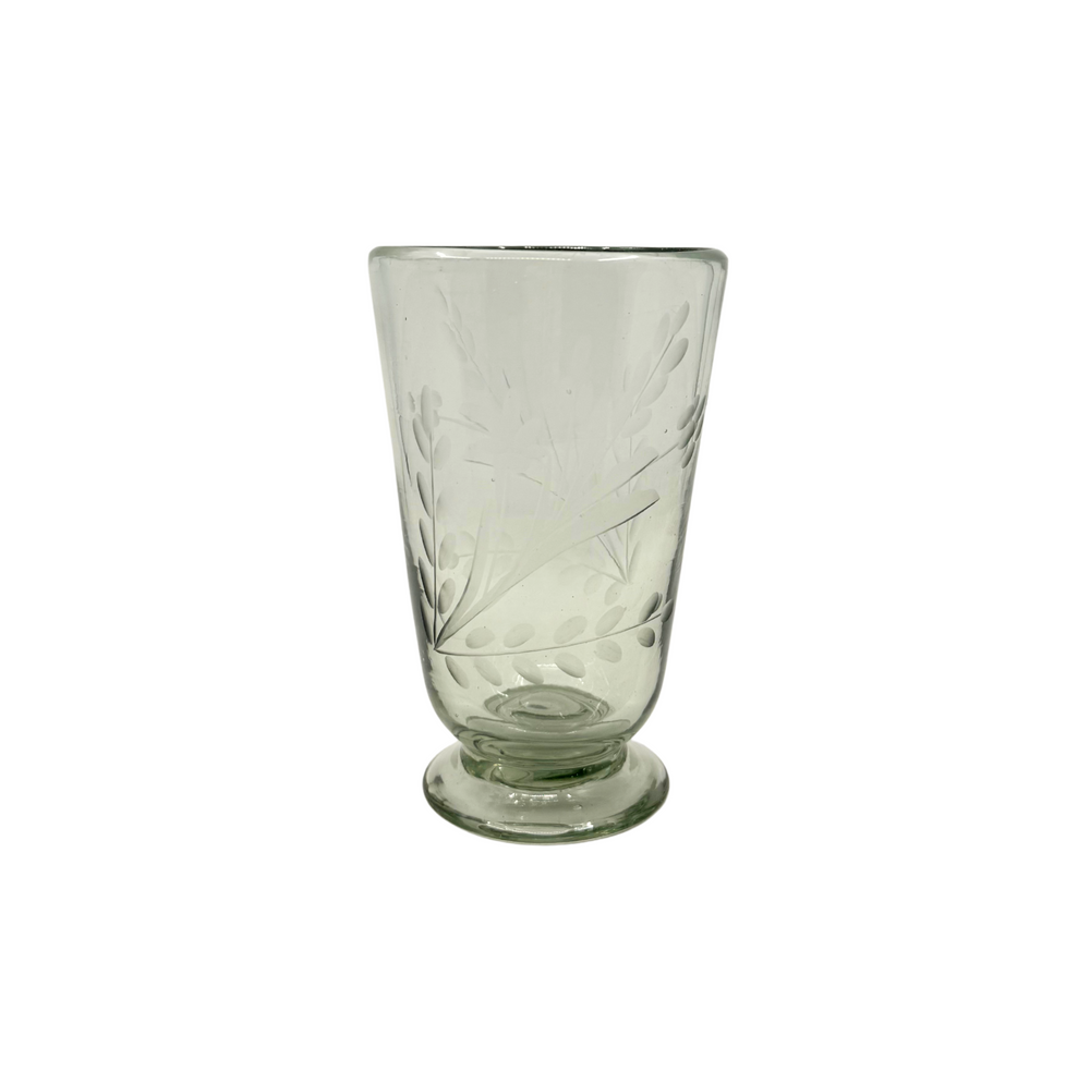 Front view of Glassware in Clear showcasing hand-etched floral pattern and footed silhouette on white background