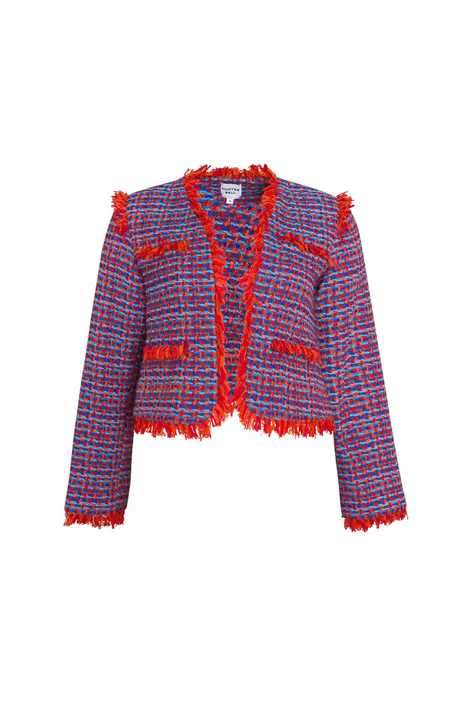 The Coco Jacket is a cropped jacket made with French lurex tweed and finished with Italian cording.