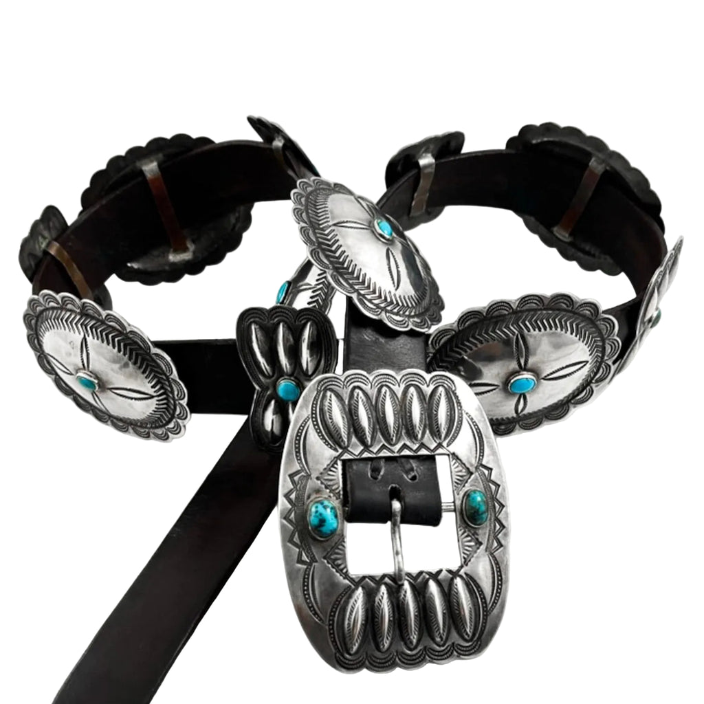 Front view of vintage Concho belt with six sterling silver conchos, five butterflies, turquoise, and black leather