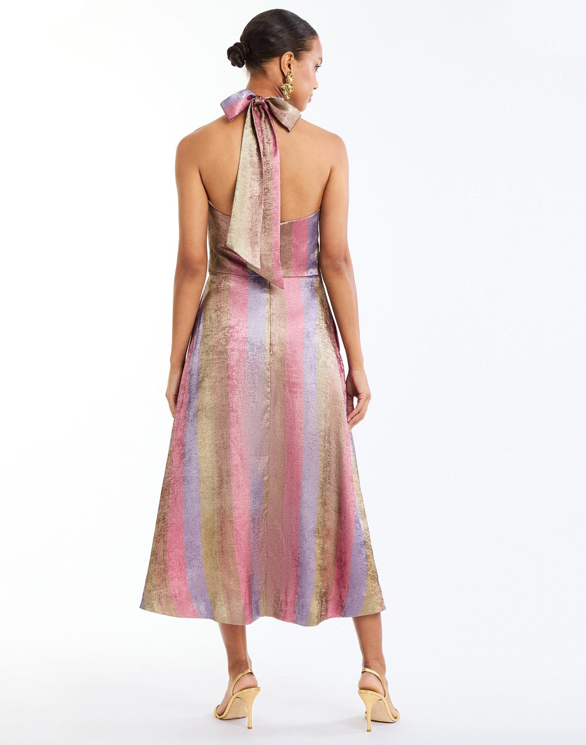 Copacabana Halter Midi Dress in Disco Stripe back – metallic lamé cocktail midi with halter neckline, bow tie, fitted waist, and pockets by Mestiza New York.