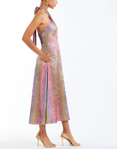Copacabana Halter Midi Dress in Disco Stripe side – metallic lamé cocktail midi with halter neckline, bow tie, fitted waist, and pockets by Mestiza New York.
