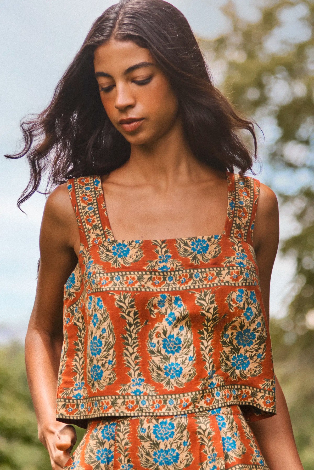Front view of Corby Top in Amber Glen Brown showcasing square neckline on a model outdoors