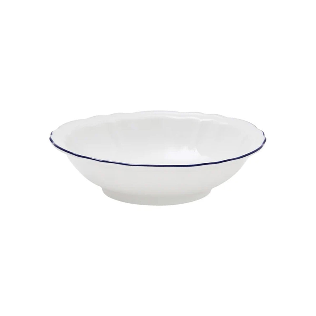 Front view of Corona fruit bowl showing scalloped rim and thin navy blue edge on white porcelain against white background
