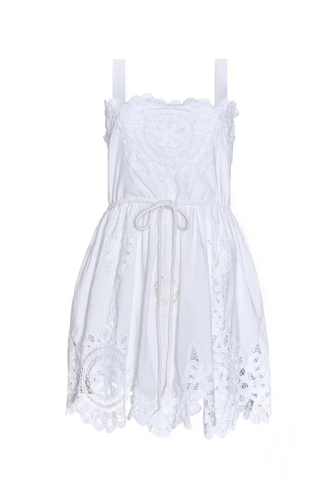 The Cosette Dress in Battenberg Cotton Lace has a relaxed silhouette and drawcord waist