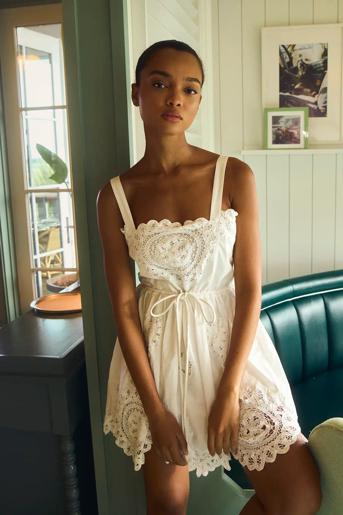 The Cosette Dress in Battenberg Cotton Lace has a relaxed silhouette and drawcord waist