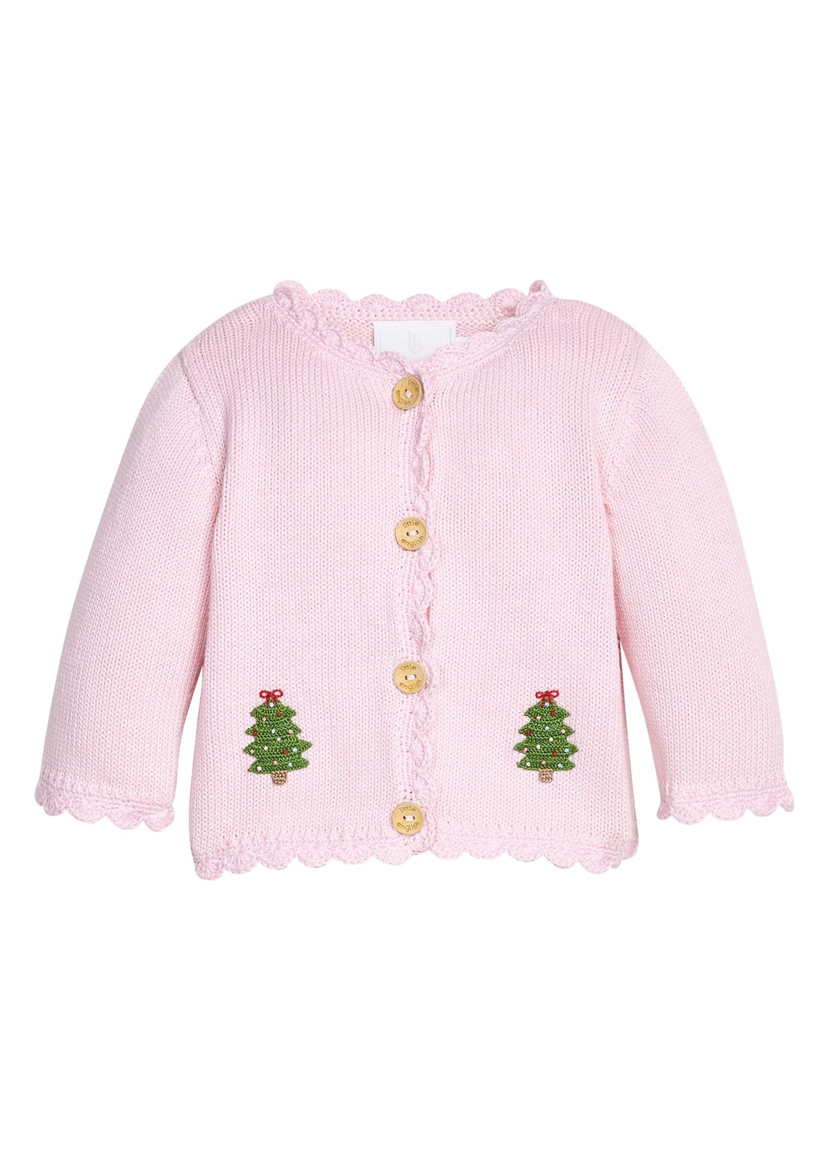 Little English traditional children's clothing.  Light pink cotton cardigan with crocheted christmas trees on either side and in back for baby girls. 