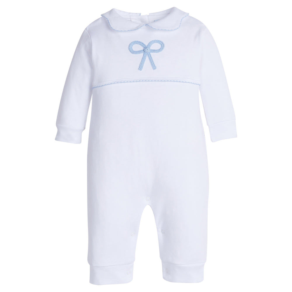 Little English traditional children's clothing.  Baby girl's white knit peter pan playsuit romper with blue bow crochet for Spring.  Gift clothing for baby girl