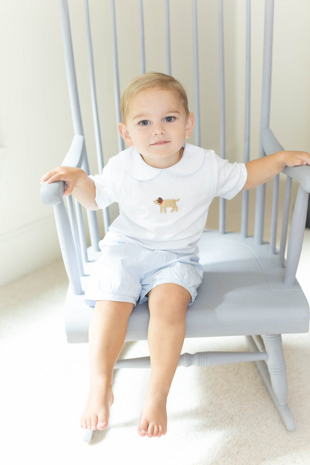 Little English traditional children's clothing.  Toddler boy's white knit peter pan shirt with dog crochet for Spring.  Gift clothing for toddler boy