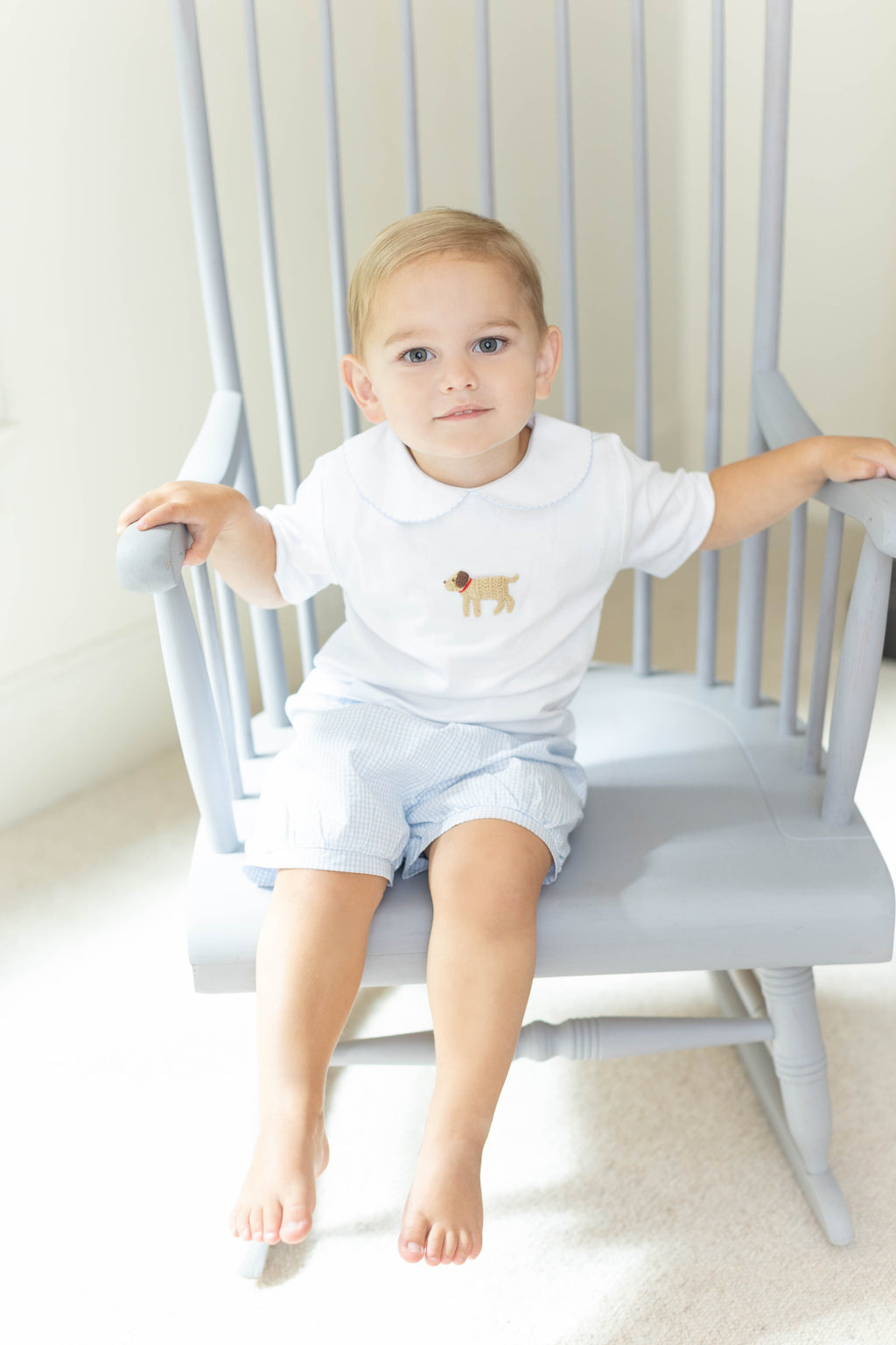 Little English traditional children's clothing.  Toddler boy's white knit peter pan shirt with dog crochet for Spring.  Gift clothing for toddler boy