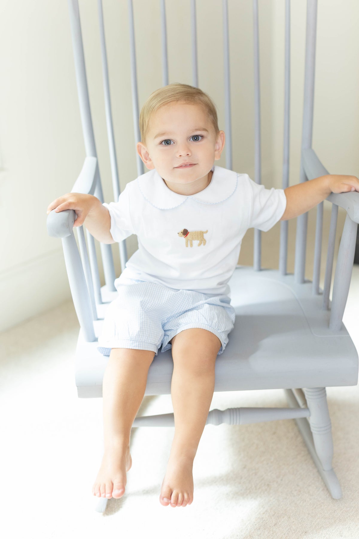 Little English traditional children's clothing.  Toddler boy's white knit peter pan shirt with dog crochet for Spring.  Gift clothing for toddler boy