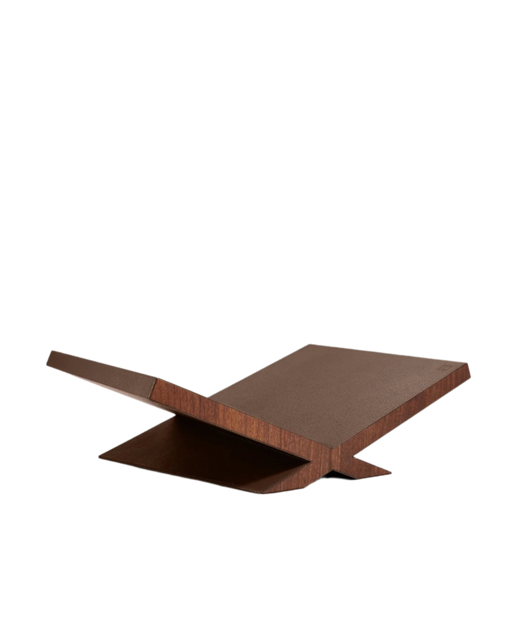 Angled view of Culture Ultimate Bookstand in brown with pebbled leather top and tilted display platform on white