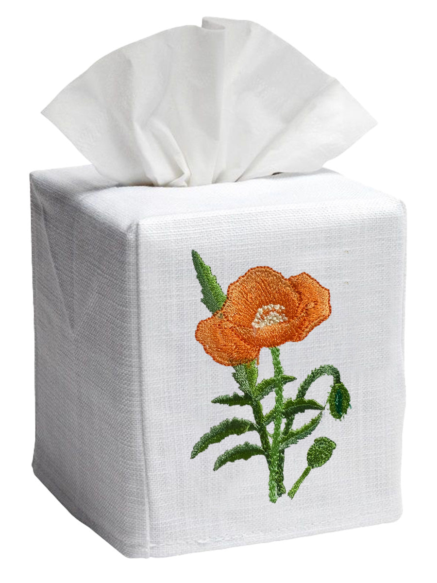 Front view of tissue box cover showcasing embroidered tangerine poppy on white cotton-linen cube with tissue top